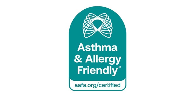 Teal badge with white text and swirl design, reading 