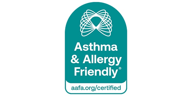 Teal badge with white text and swirl design, reading 