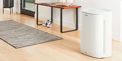 A Filtrete™ Room Air Purifier in a room
