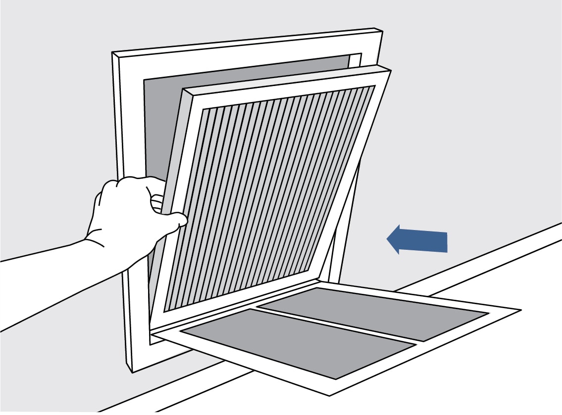 Placing Filtrete™ air filter in wall HVAC unit
