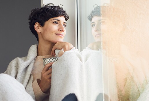 Woman looking out the window