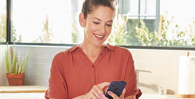Woman looking at her smart phone
