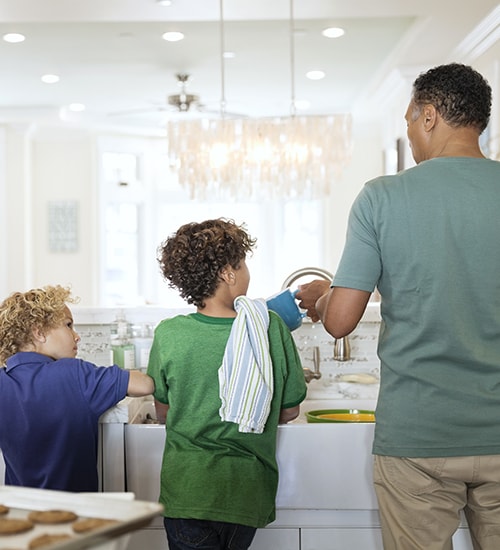 Family Washing Dishes
