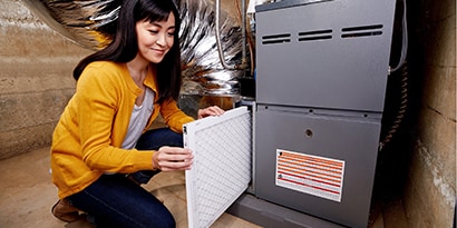 A woman replacing her HVAC system.