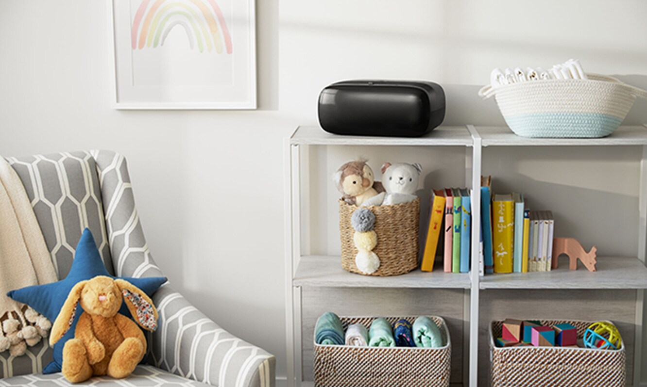 Filtrete™ small, black table top room air purifier in baby nursery
