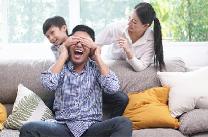Family and child playing together during self quarantine stay at home. Asian family use time together fun activities stuck at home during time the coronavirus outbreak